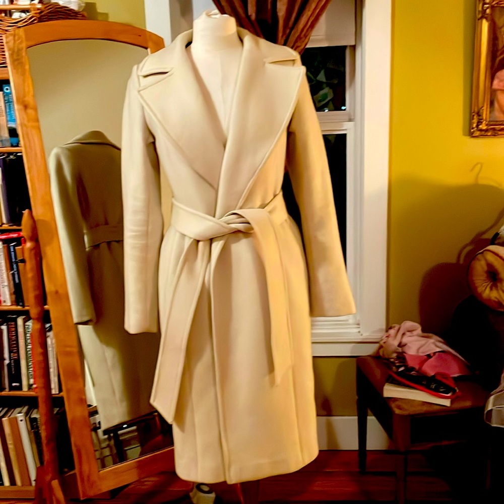 Custom tailored. Size small. Beige wool, blue and magenta silk lining.
